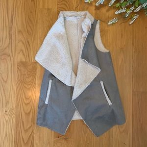 Suede, fur lined vest with pockets